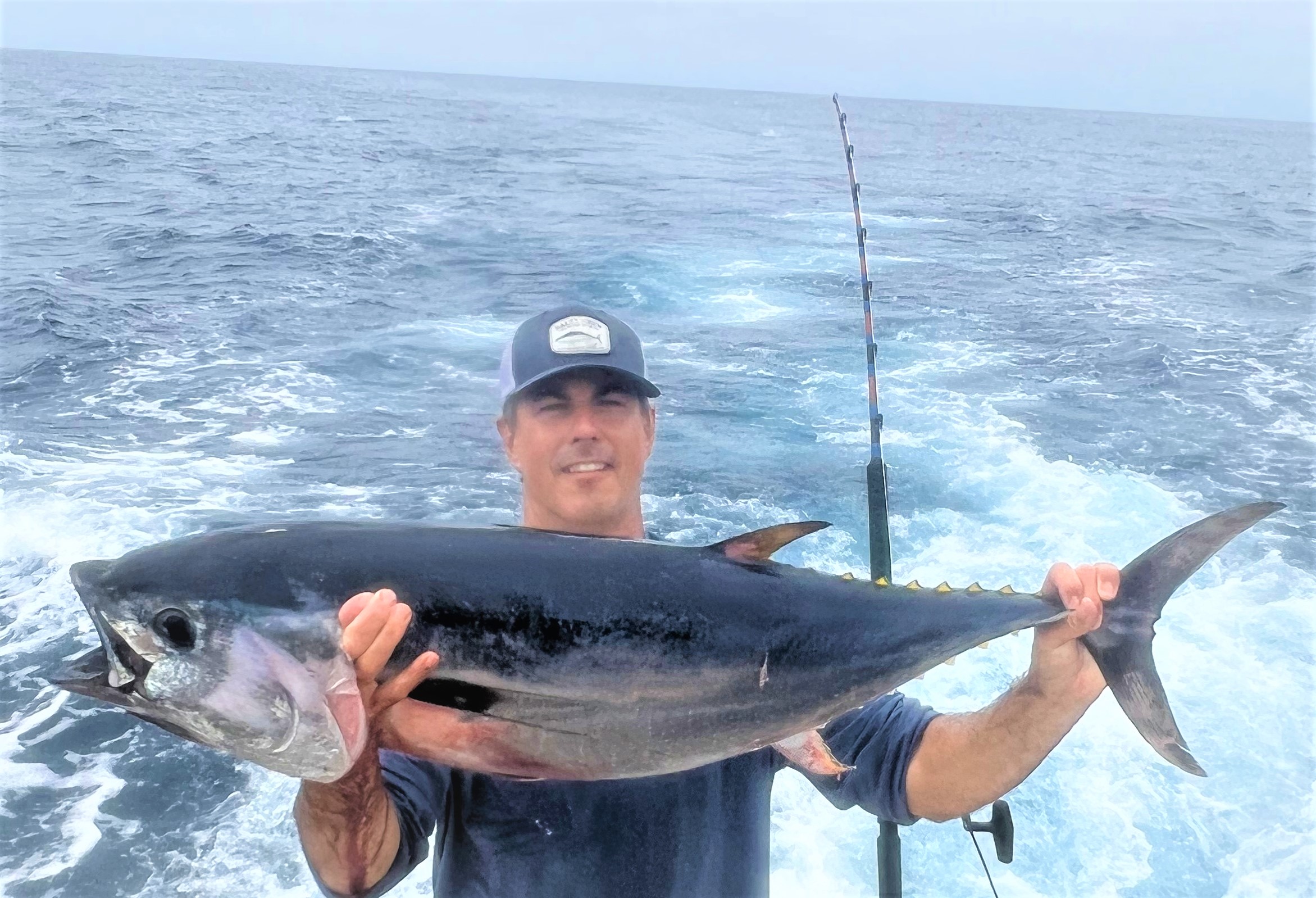Man holding a large tuna fish